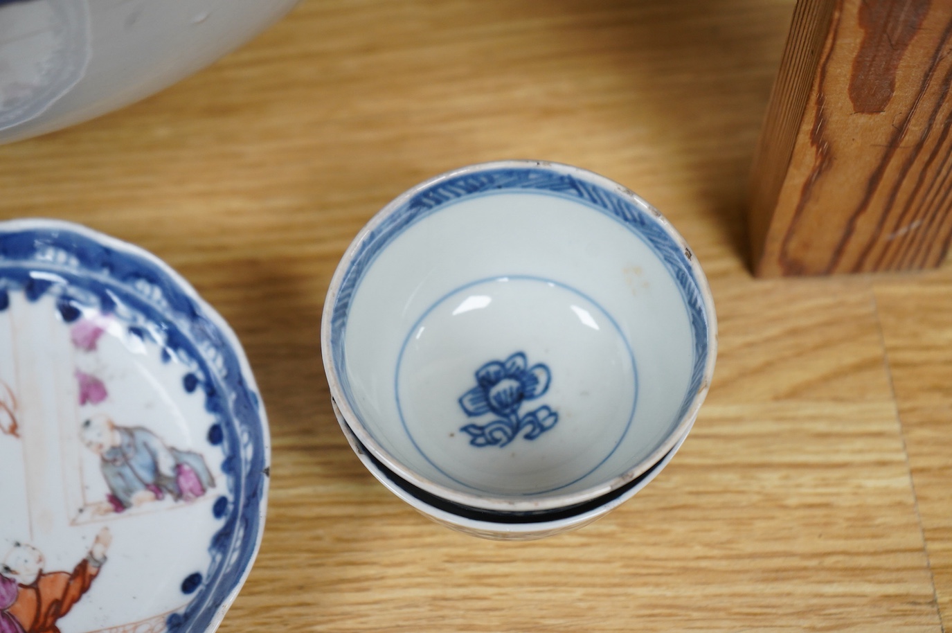 An 18th/19th century Chinese tea bowl and saucer, a punch bowl, two tea bowls and a Paris porcelain vase, largest 31cm